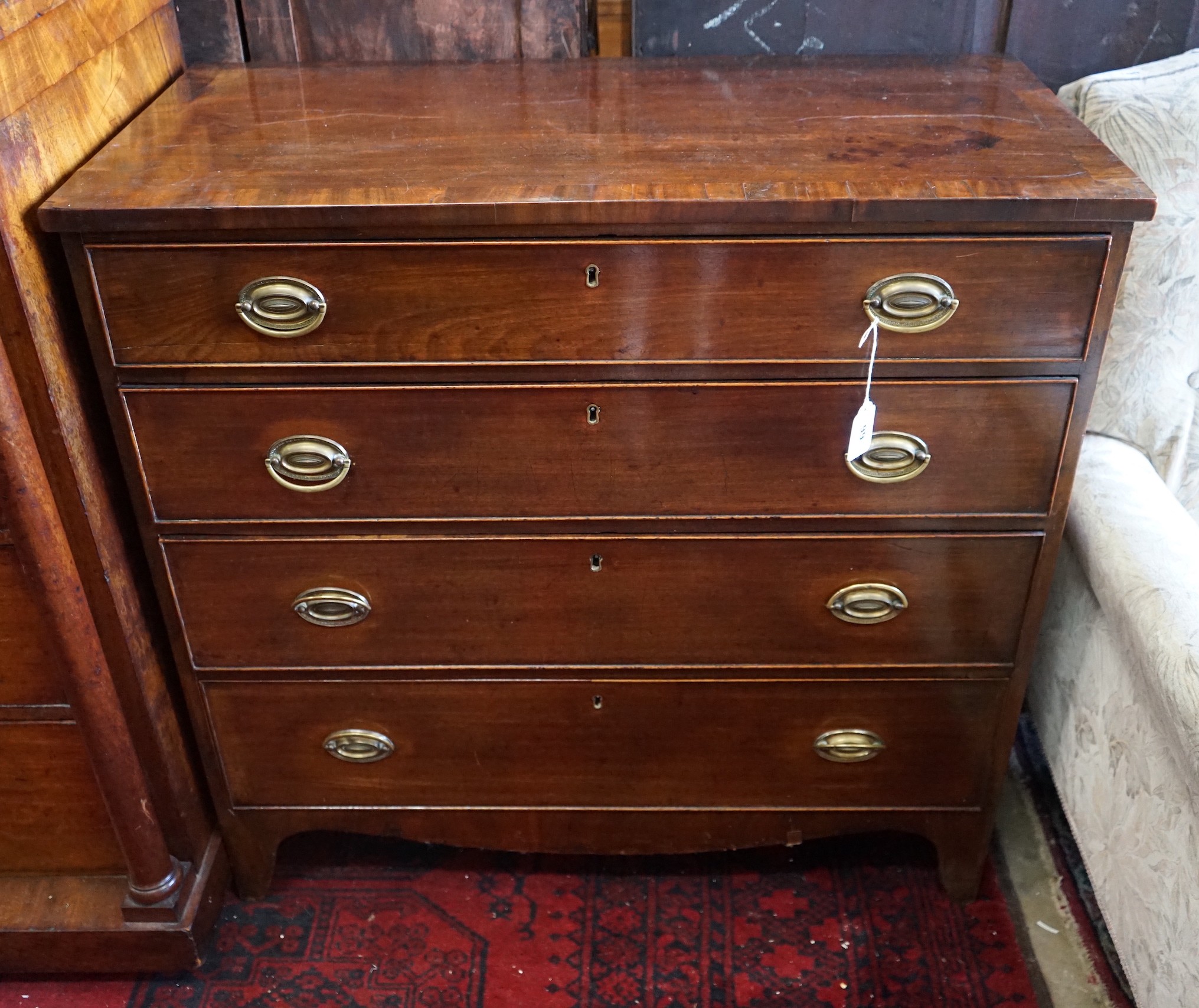 A George IV banded mahogany chest of drawers, width 91cm, depth 45cm, height 90cm